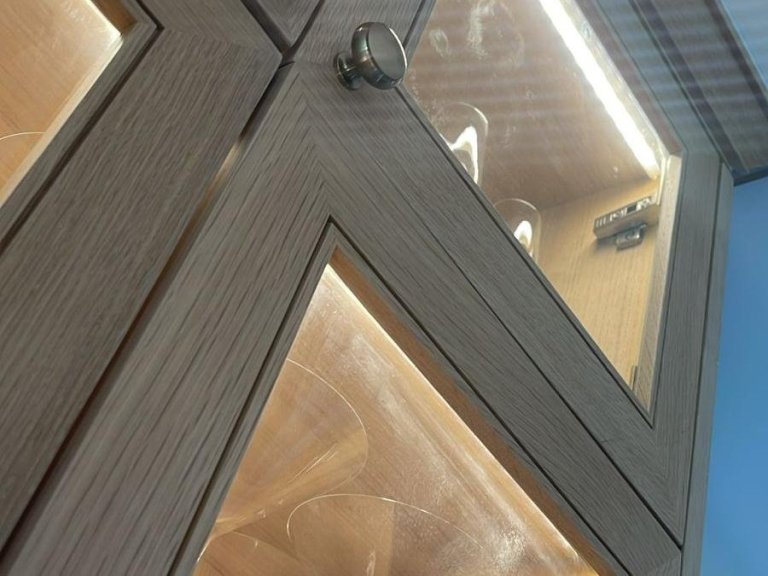 Custom LED lighting inside a glass display cabinet