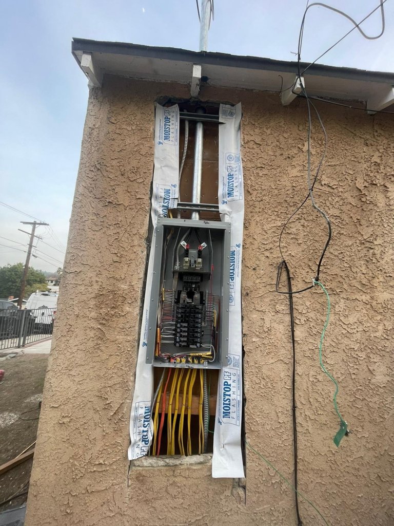 New exterior service panel with fresh wiring